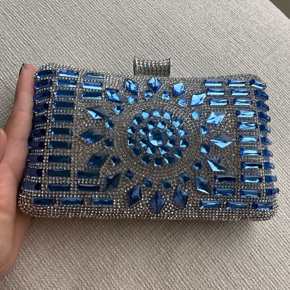 bright blue CLUTCH. Never wore it.
